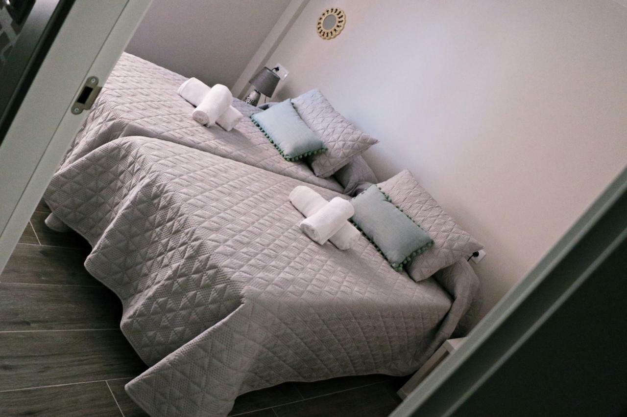 Apartamentos Credencial Саррия Экстерьер фото